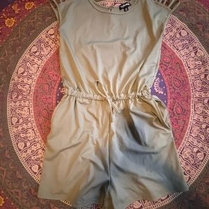 Women’s summer romper-culotte. One piece romper in army green adjustable waist